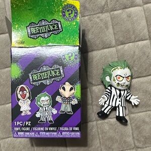 Funko Beetlejuice Figure with Green Hair and Black Stripes